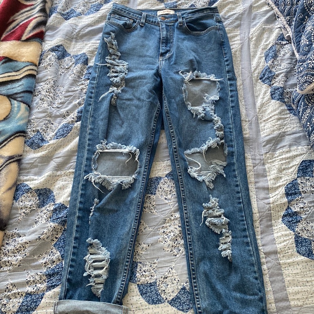 vibrant blue ripped jeans